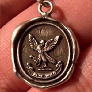 Pyrrha pendant “limitless” with 20” original chain. Used condition, silver